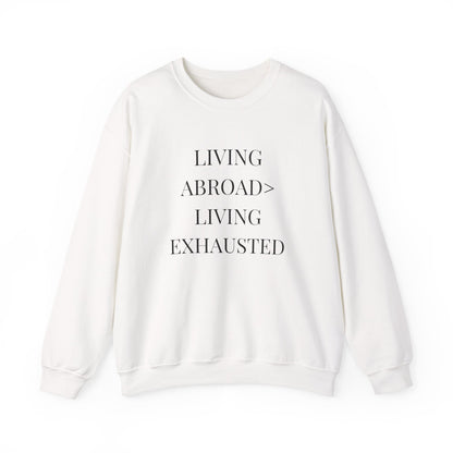 Crewneck Sweatshirt — "Living Abroad > Living Exhausted"