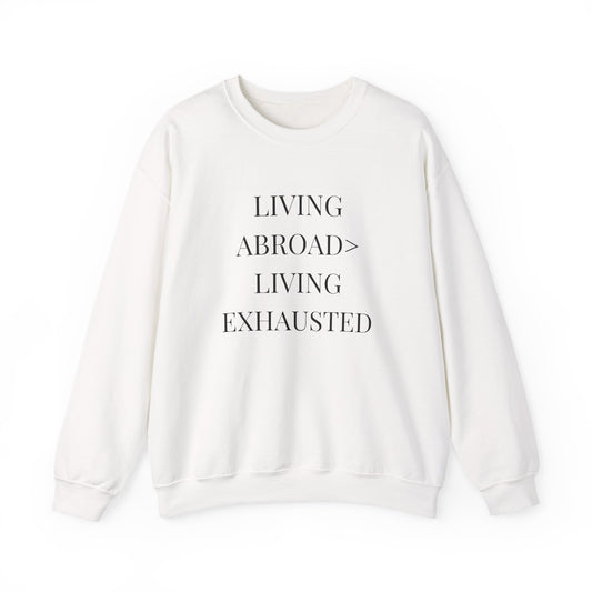 Crewneck Sweatshirt — "Living Abroad > Living Exhausted"
